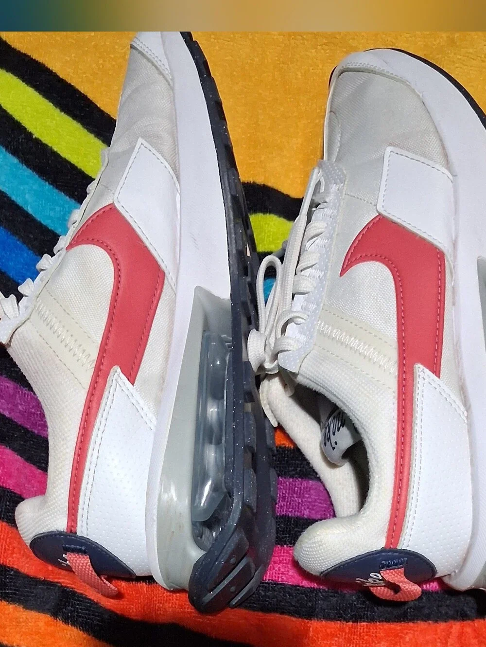 Nike Women’s White Sneakers with Red Swoosh